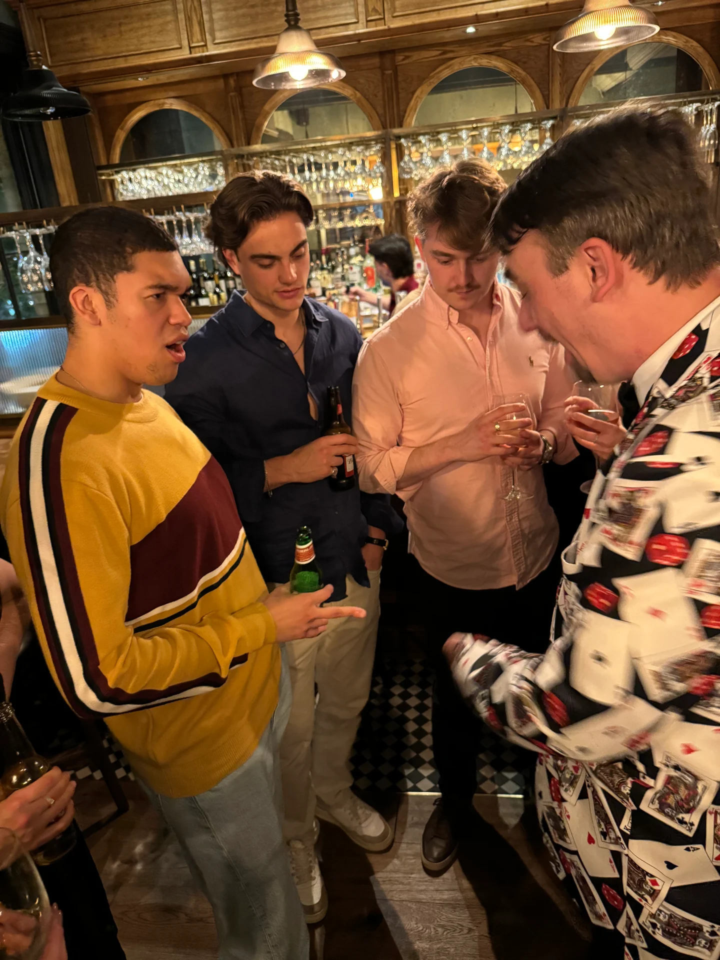 Ash entertaining a group of guests